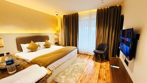 Deluxe Double Room, City View | Desk, laptop workspace, free WiFi