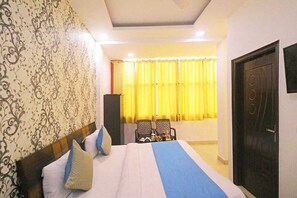 Deluxe tweepersoonskamer | Verduisterende gordijnen, een strijkplank/strijkijzer, extra bedden