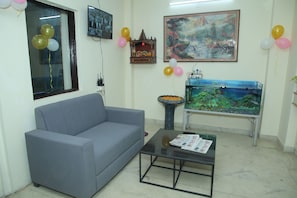 Superior Room | Living area | 32-inch Smart TV with digital channels, Netflix, streaming services - Hotel Viraj Residency (New Delhi)