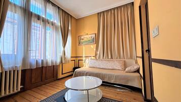 Deluxe Double Room, Balcony, City View | In-room safe, desk, soundproofing, iron/ironing board