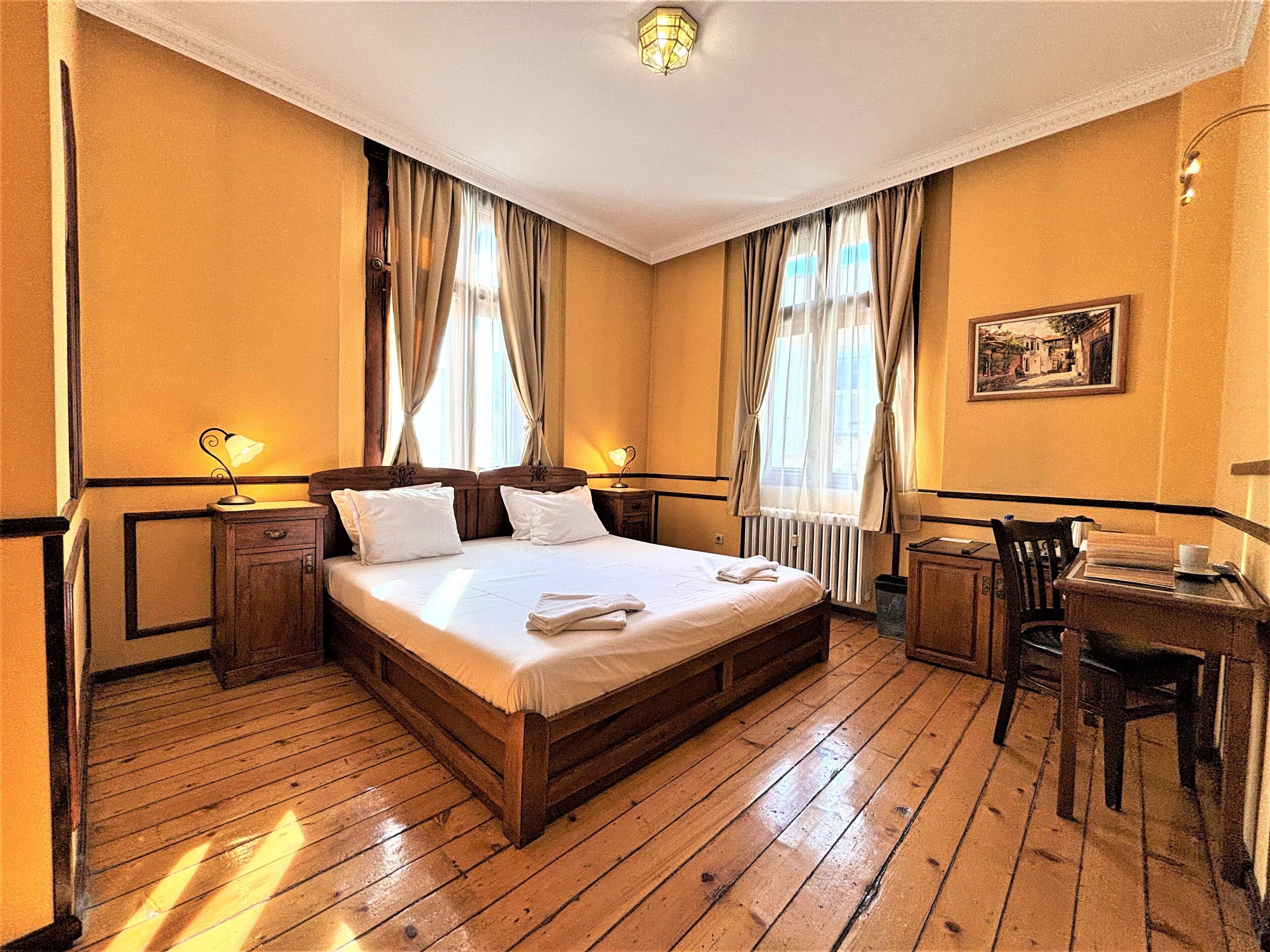 Deluxe Double Room, Balcony, City View | In-room safe, desk, soundproofing, iron/ironing board
