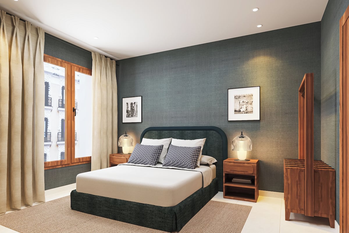 Luxe beddengoed, donsdekens, een kluis op de kamer, een laptopwerkplek