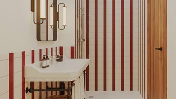 Douche, sĂšche-cheveux, serviettes fournies, savon