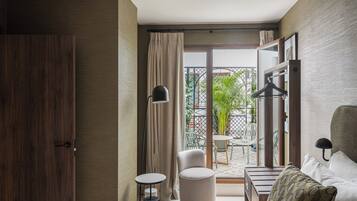 Premium bedding, down comforters, in-room safe, laptop workspace
