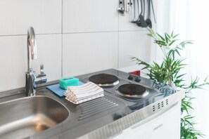 Premium-Apartment, Blick auf die Anlage | Eigene Küche