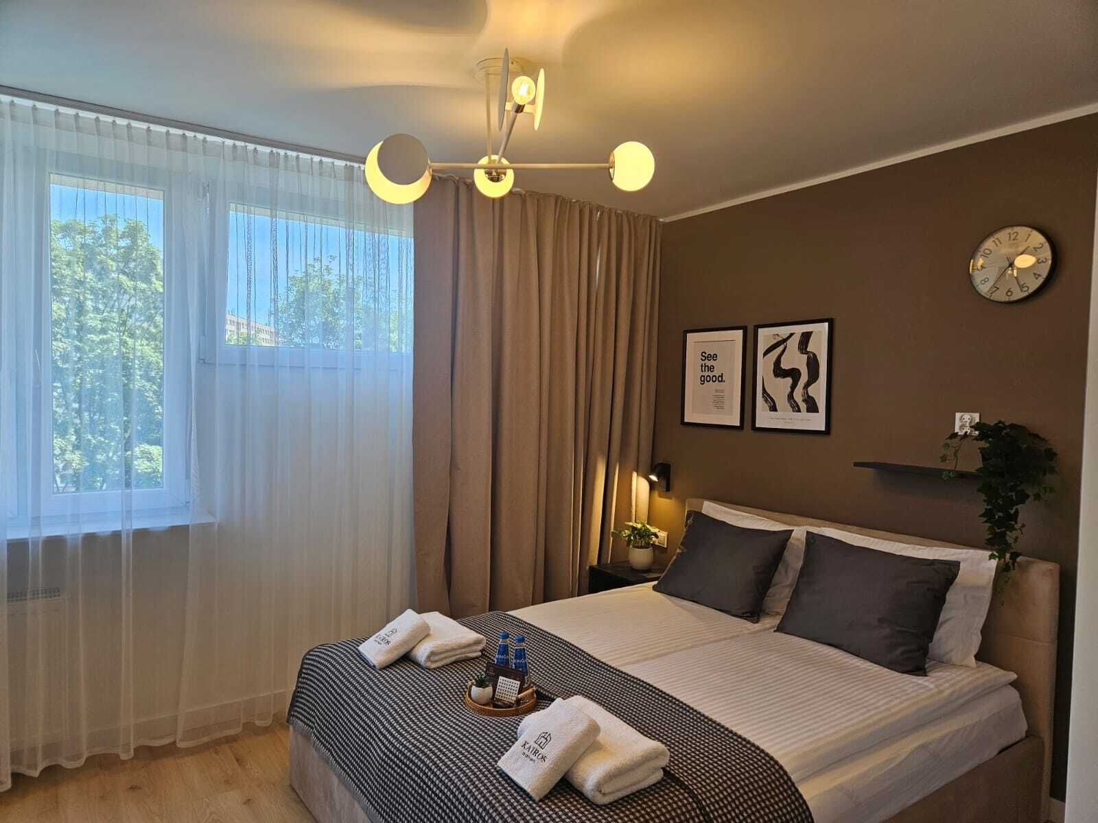 Desk, laptop workspace, blackout curtains, iron/ironing board
