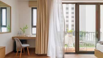 Premium bedding, minibar, desk, laptop workspace