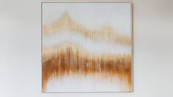 A minimalist artwork on a plain wall.