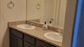 Hair dryer, towels, soap, toilet paper