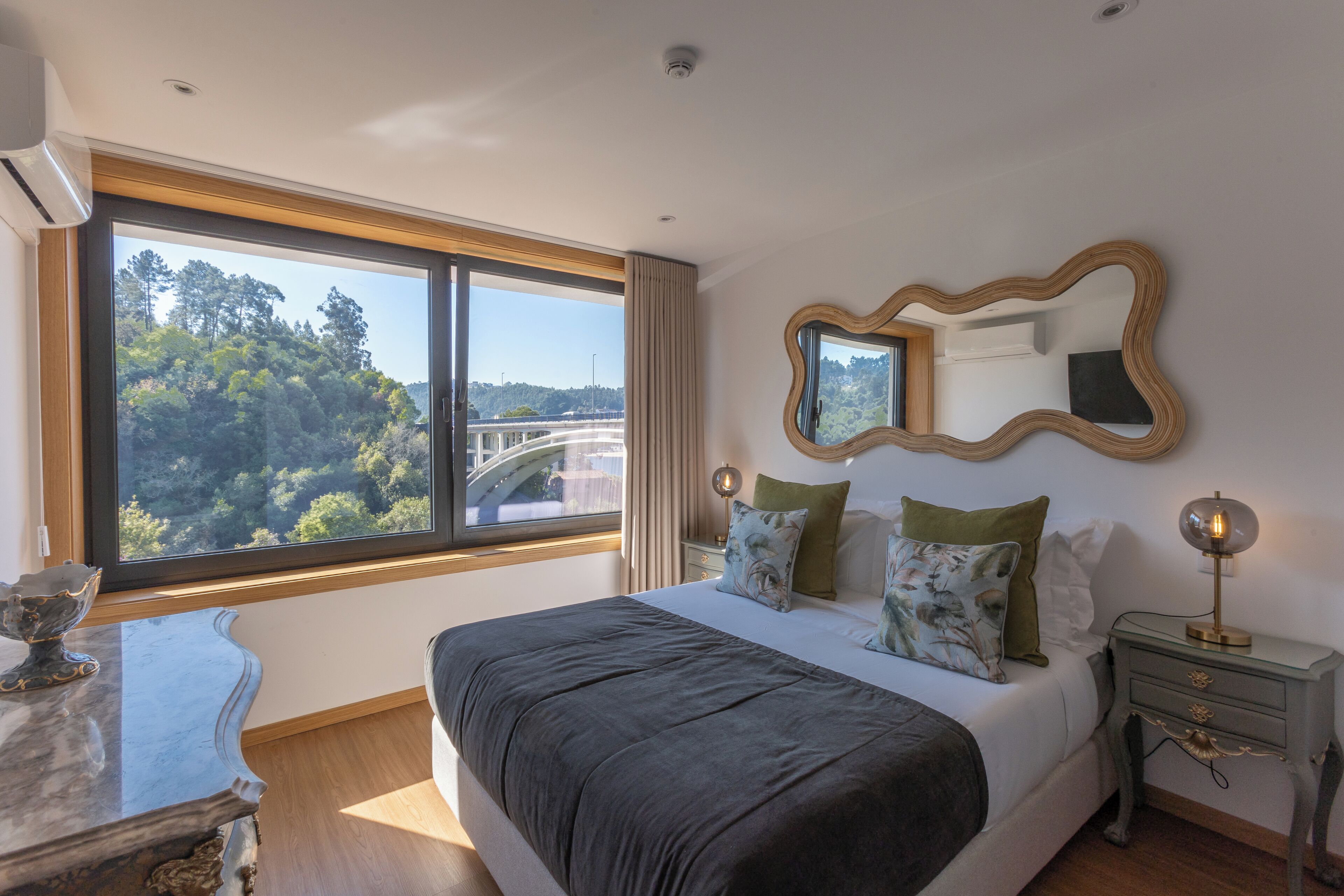 Apartment, River View | Minibar, in-room safe, individually decorated, individually furnished