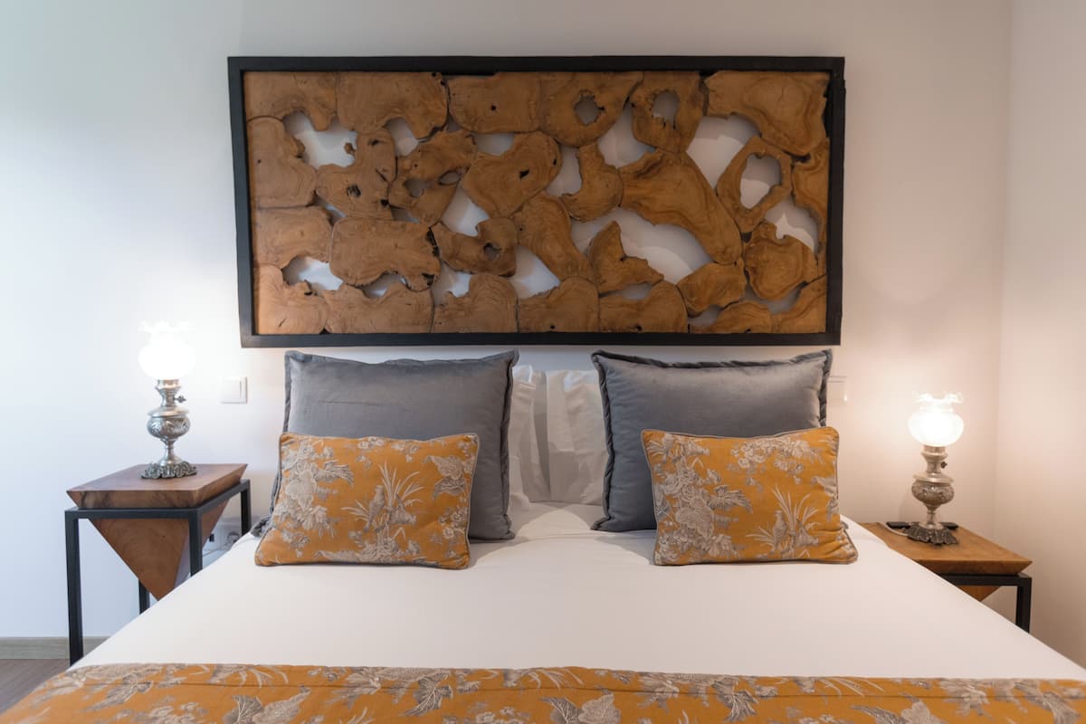 Apartment, River View | Minibar, in-room safe, iron/ironing board (on request), cribs (free)