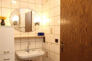 Ducha, secador de pelo