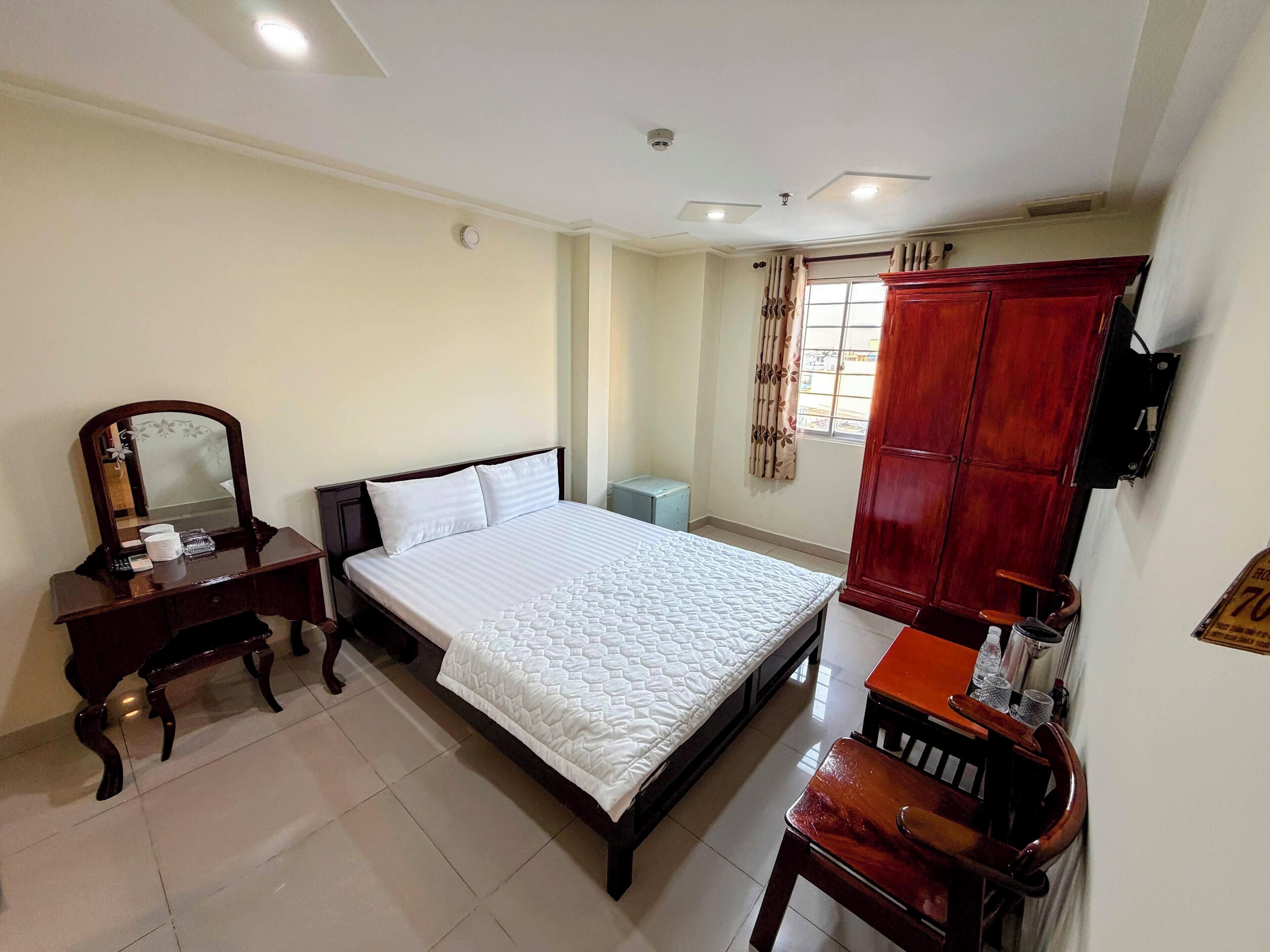 Chambre Deluxe | Bureau, espace de travail pour ordinateur portable, rideaux occultants