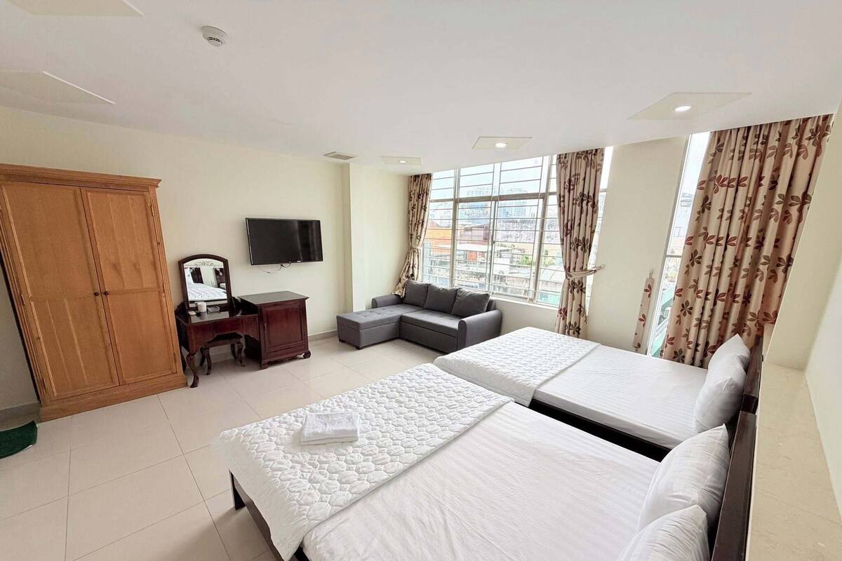 Family Room, City View | Desk, laptop workspace, blackout drapes, soundproofing