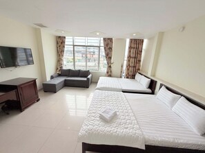 Family Room, City View | Desk, laptop workspace, blackout drapes, soundproofing