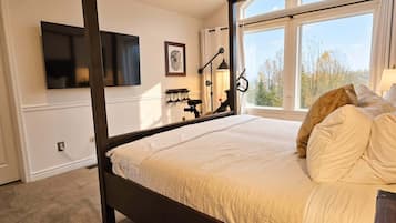 1 bedroom, desk, iron/ironing board, travel crib