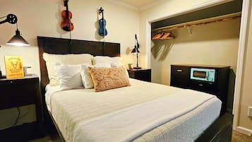 1 bedroom, desk, iron/ironing board, travel crib