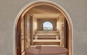 Separate tub and shower, rainfall showerhead, free toiletries