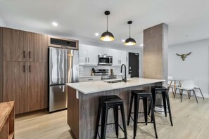 Fridge, microwave, oven, stovetop - Corporate Stays |Millennium Boulevard 1 Bedroom (Moncton)