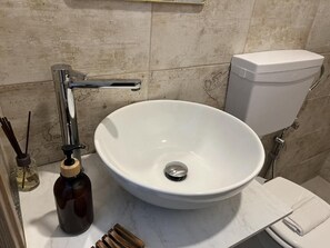 Triple Room | Bathroom | Shower, hair dryer, towels, soap