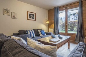TV, fireplace - Capucins 2 Bed Garden Apartment, Les Gaillands (Chamonix-Mont-Blanc)