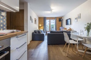 TV, fireplace - Capucins 2 Bed Garden Apartment, Les Gaillands (Chamonix-Mont-Blanc)