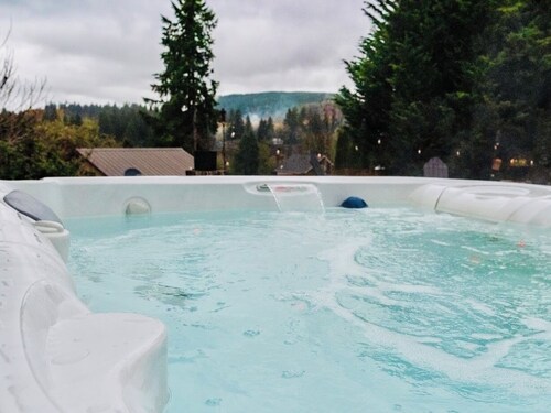 Backyard with hot tub and fire pit! 