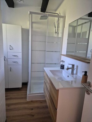 Shower, hair dryer, towels, soap