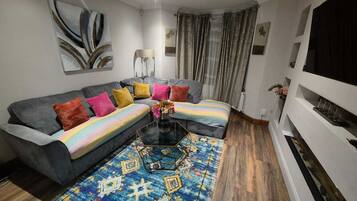 TV, fireplace, books, offices