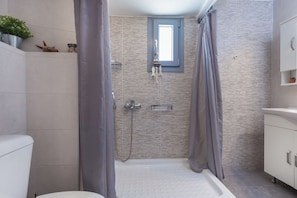 Hair dryer, towels, soap, toilet paper
