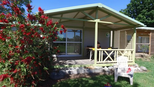 Logement climatisé au bord de mer pour 6 personnes avec terrasse privée, jardin commun et Wi-Fi
