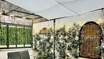 Quarto casal, vista para o pátio | Terraço/pátio