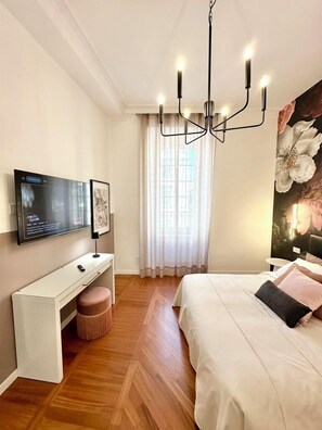 Deluxe Double Room, City View | Minibar, desk, blackout drapes, iron/ironing board - Vacanze Romane Suite 7 Languages (Rome)
