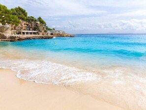 Perto da praia, areia branca 