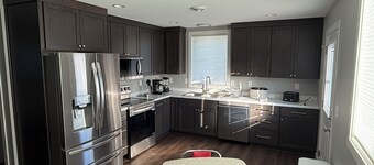 New Furnished Two Bedroom, One Full Bath, Single Level, Attached Heated Garage