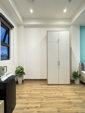 Suite de lujo, patio, vistas al patio | Tabla de planchar con plancha y wifi gratis