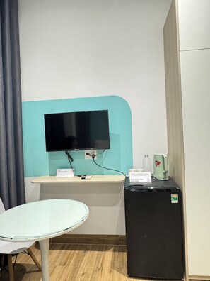 Luxury Suite, Patio, Courtyard View | Television