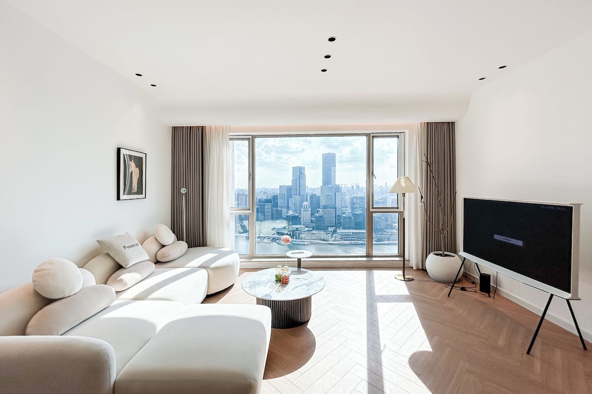 Family Suite, 2 Bedrooms, City View | Living area | TV