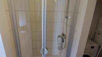 Shower, eco-friendly toiletries, hair dryer, towels