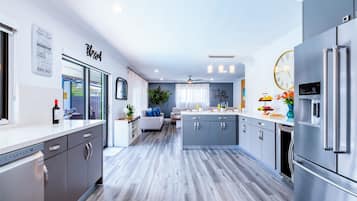 Coffee/tea maker, fridge, microwave, oven