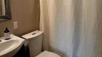 Hair dryer, towels, soap, toilet paper