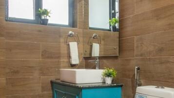 Shower, towels, soap, toilet paper