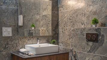 Shower, towels, soap, toilet paper