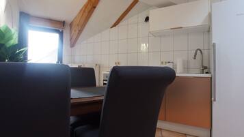 Deluxe Apartment, Balcony | In-room dining