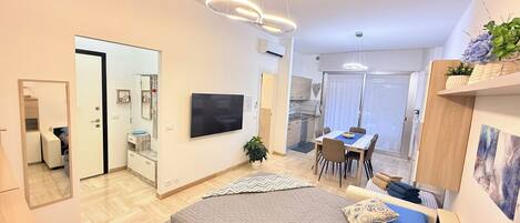 Fer et planche à repasser, draps fournis