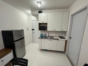 Private kitchen - Fully Equipped Apartments in a Privileged Location, 150m From the Beach in Salvador Sess (Salvador)