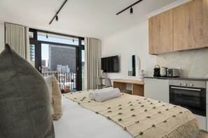 Coffres-forts dans les chambres, fer et planche à repasser