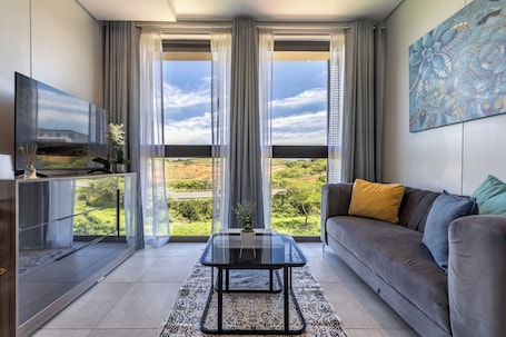 TV. Elegant Zimbali Lakes 2BR | Modern Design
