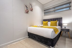 Fer et planche à repasser, draps fournis