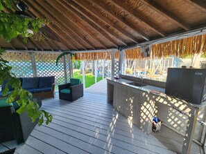 Terrace/patio - Seminole Beach Retreat! 8 Beds, Huge Heated Pool, 2 miles to Indian Rocks Beach! (Seminole)